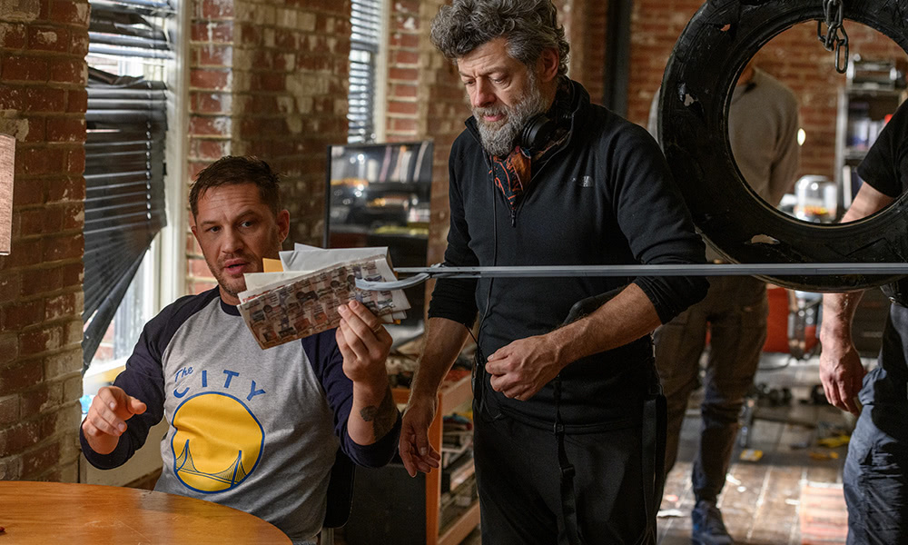 Tom Hardy as Eddie Brock and director Andy Serkis on the set of Venom: Let There Be Carnage