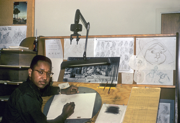 Image Courtesy of ANIMATED LIFE, LLC, Floyd Norman sits at the board as an inbetweener on Sleeping Beauty, 1956