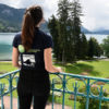An Annecy 2018 event staffer takes in the view from The Imperial Palace. [Photo : F. Blin/CITIA]